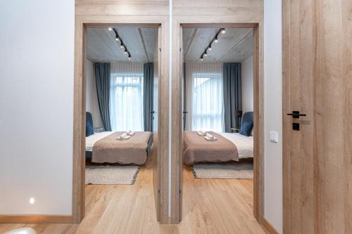 Brand New White Lotus Apartment 3 by Reside Baltic