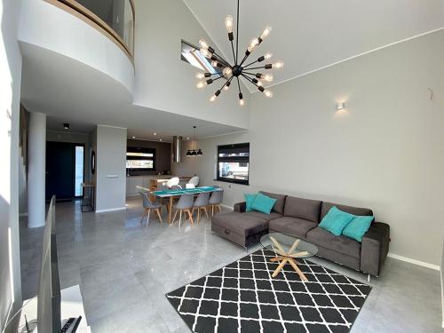 Koplietošanas atpūtas telpa ar TV, Sand Valley Golf Resort in Paslek