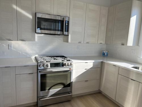 Second Floor Duplex Just Steps Away From The Beach in Brant Beach, USA