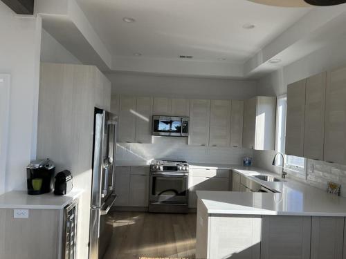 Second Floor Duplex Just Steps Away From The Beach in Brant Beach, USA