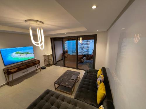 Shared lounge/TV area, Appartement Ocean View - Marina Casablanca in Sour Jdid