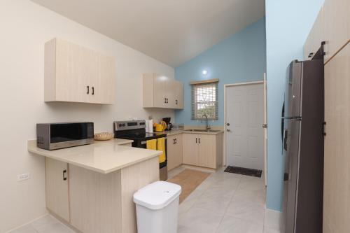 Osmax Oasis, 1BD and 1 BA, Gated, near Puerto Seco Beach in Discovery Bay