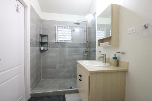 Osmax Oasis, 1BD and 1 BA, Gated, near Puerto Seco Beach in Discovery Bay