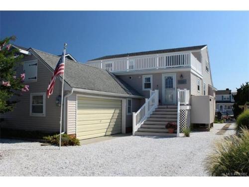 Your Boat Is Welcome At This Lagoon Front Home! in Brant Beach, USA