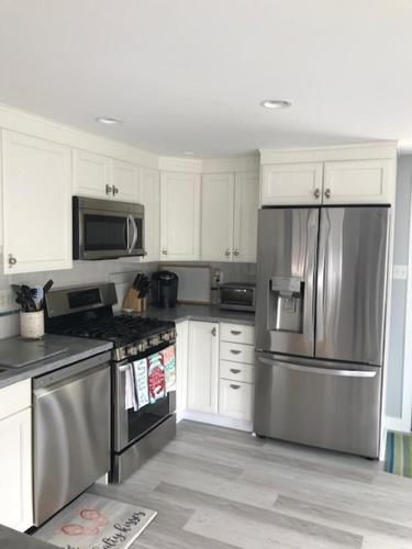 Hear The Ocean From This Well Kept Oceanside Duplex image