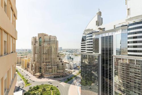 Beautiful 1BR Apt with city views at silicon Dubai
