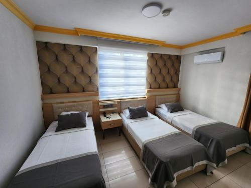 ANTALYA Konyaaltı Gündüz Otel Room Type - Standard Triple Room