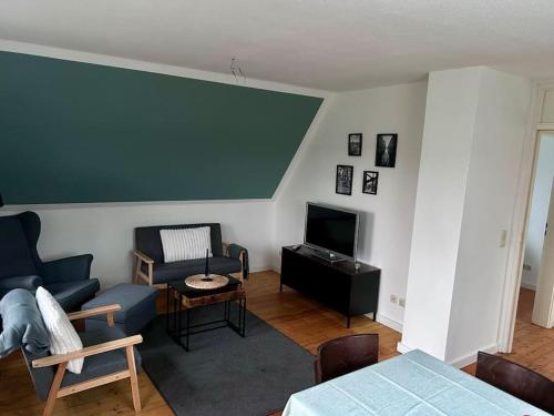 Shared lounge/TV area, Ferienhaus am Poggensee in Bad Oldesloe