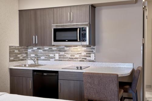 Queen Suite with Two Queen Beds and Kitchenette