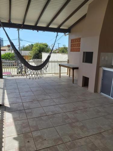 Apto com terraço coberto