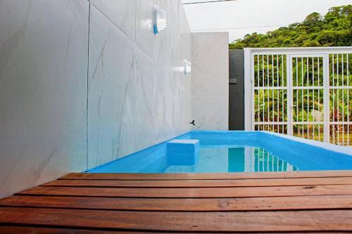 CASA INDIVIDUAL CoM PISCINA, AR, WI-FI, ATÉ 16 PESSOAS, Itapema