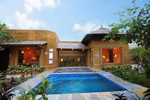 Swimming pool, Nature Village Resort in Surajkund
