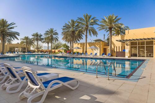 Swimming pool, Al Hamra Village Hotel in Ras Al Khaimah