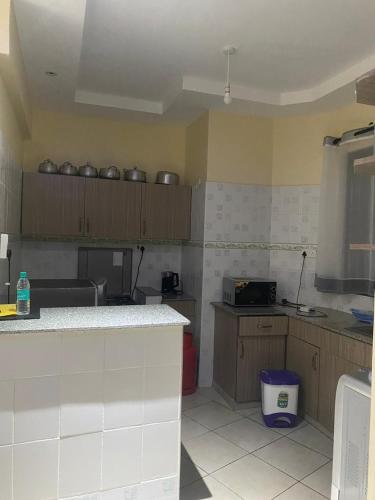 Konyha, Stay.Plus Shanzu Apartment in Shanzu Beach