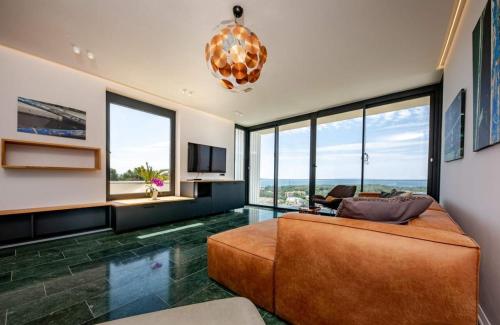 Luxury villa with a swimming pool Palit, Rab - 22153 in ปาลิต