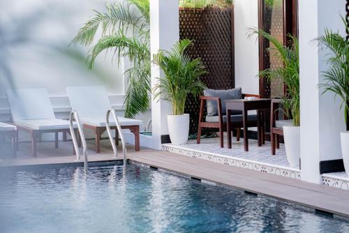 518114094 Cozy An Boutique Hotel Luangprabang