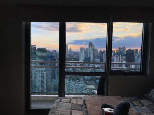 Vibrant 1BR Acqua Livingstone with Netflix, Pool & Gym, Manila (fotografie 7)