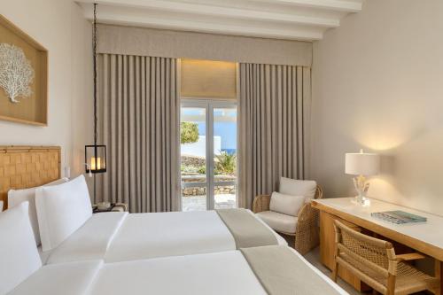 Habitación Resort con balcón - 1 cama extragrande o 2 individuales