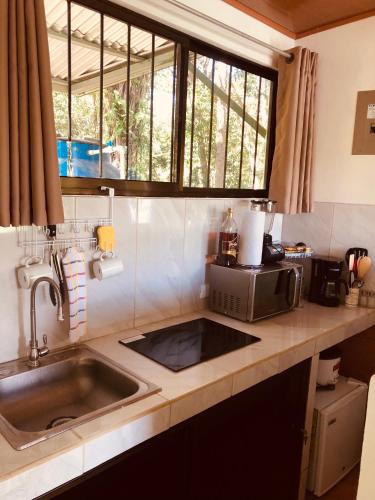 Casa Encantada offers you Two-Bedroom House, 1 Tiny Apartment & 3 Double Rooms in Quepos