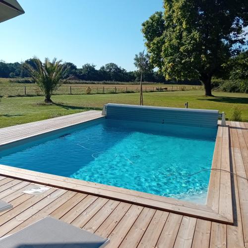Balkons/terase, Maison neuve avec piscine chauffée, 4 kms de Contis plage (Maison neuve avec piscine chauffee, 4 kms de Contis plage) in St Julien En Born