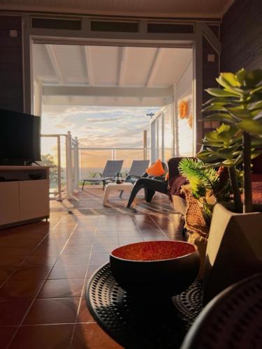 Shared lounge/TV area, Villa MauCa in Pointe-Noire