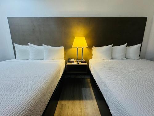 Queen Room with Two Queen Beds - Non-Smoking room in Ramada by Wyndham San Diego Airport