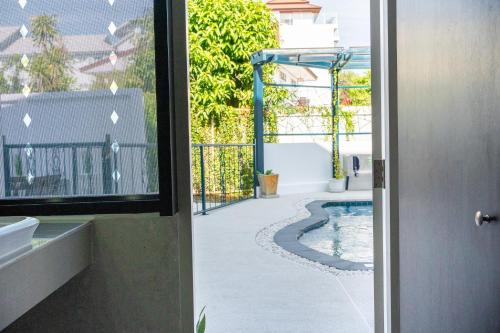 Swimming pool, Singharaj Boutique Hotel near Buak Hard Public Park