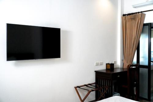 Singharaj Boutique Hotel - Tap to explore photos