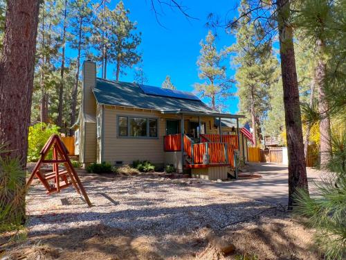 AC, spa, game room, and deck at The Golden Forest in Big Bear City, USA