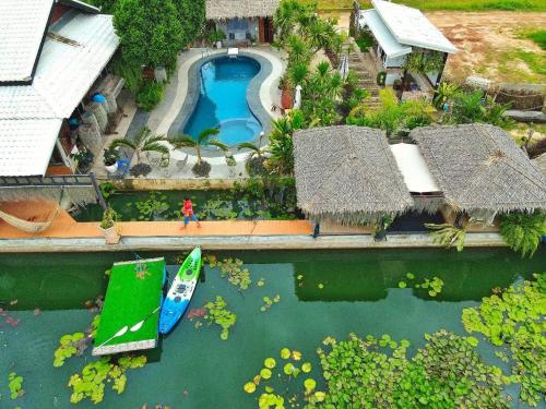 Khon Kaen ปีกไม้วิลล่าบ้านMaya-มายา 3-Star Hotel exterior