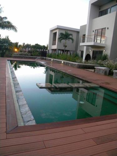 Modern Eco-Townhouses in Grand Baie - 7 Mins Walk to Beach - Tap to explore photos
