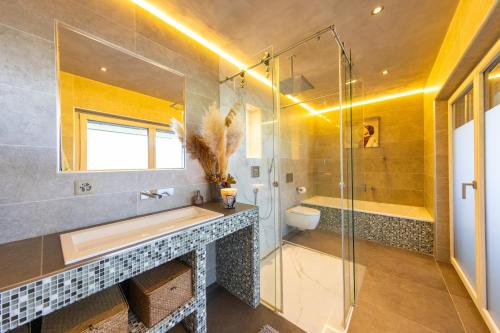 Vannas istaba, Résidence moderne avec jacuzzi (Residence moderne avec jacuzzi) in Icogne