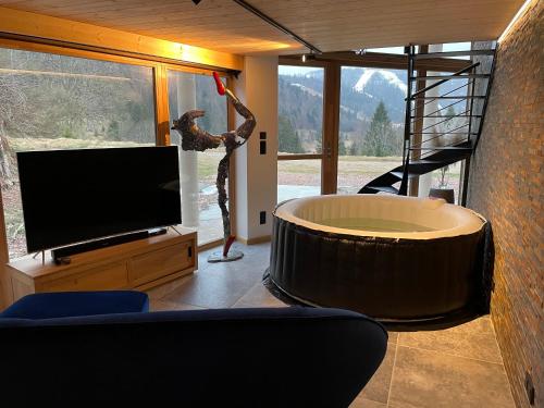 Loft haut de gamme avec jacuzzi - Location saisonnière - La Bresse