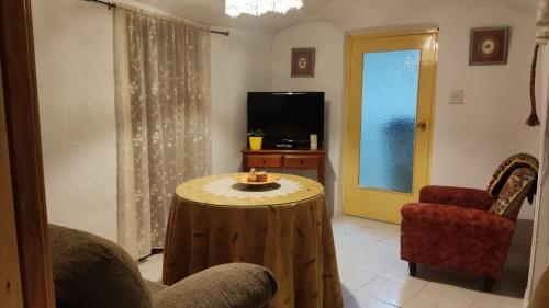 Közös társalgó / TV, Cueva la Tita del Pan in Freila