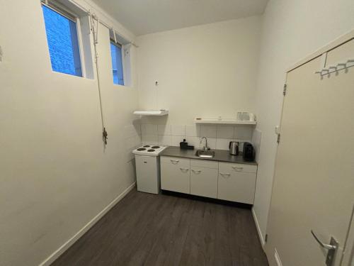 Hermanos City Appartement in Város