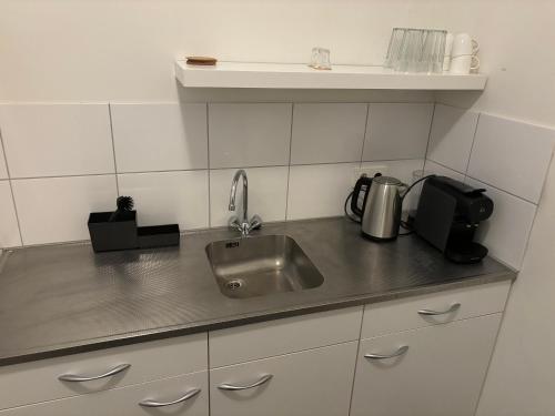 Hermanos City Appartement in Város