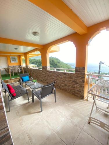 balkon/terras, Appartement spacieux Les Anses-d'Arlet 100 m² vue mer et montagne in Les Anses-d'Arlet