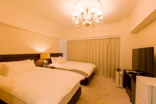 Twin room, deluxe, 4 beds