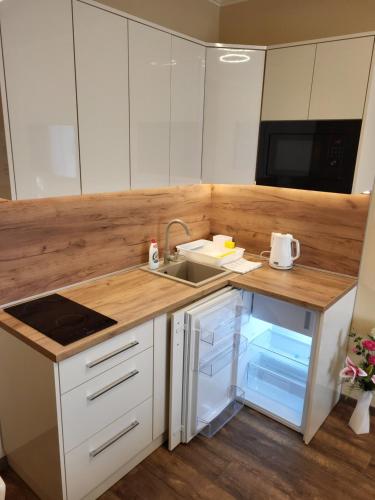 Kitchen, Gloria Apartman Szarvas in Szarvas