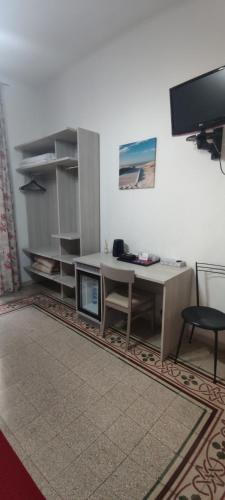 Habitación triple, balcón