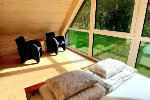 Ferienhaus“ Blaues Wunder“ am Wasser mit Grill in Nowe Warpno