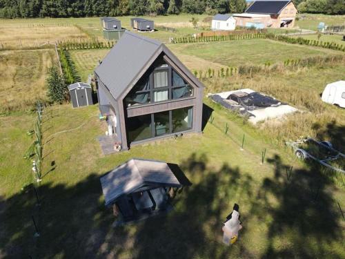 Ferienhaus“ Blaues Wunder“ am Wasser mit Grill in Nowe Warpno