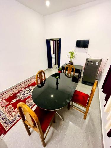 Közös társalgó / TV, Evaa Homes in Rajakkad