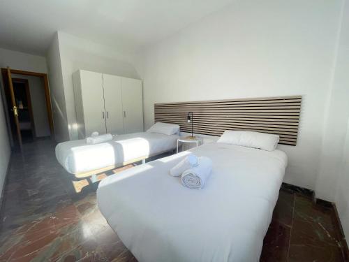 Apartamentos El Pilar Suites 3000