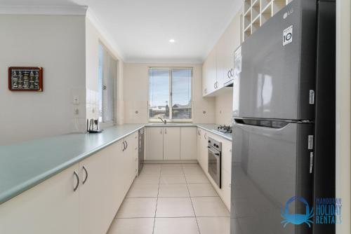 浴室, Villa 55 by the Waters Edge in 曼哲拉城