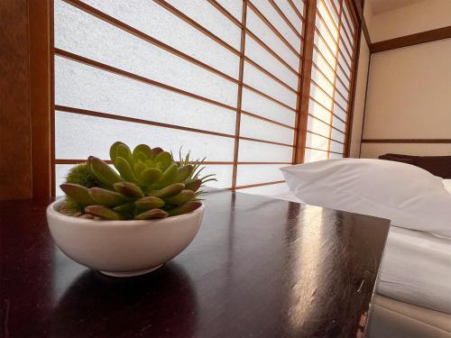 Studio Apartment with Balcony, Shared Bathroom 201