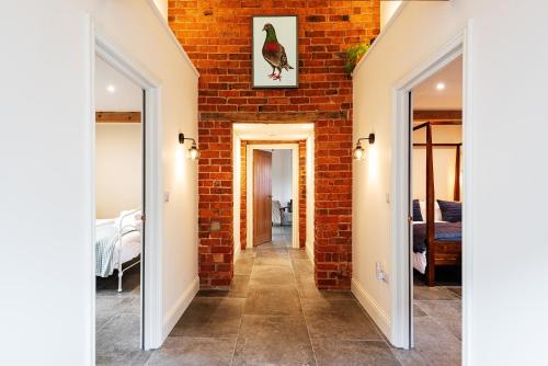 Entree, Pigeon House - Unique Barn with private garden, hot tub and wood burner in Plealey