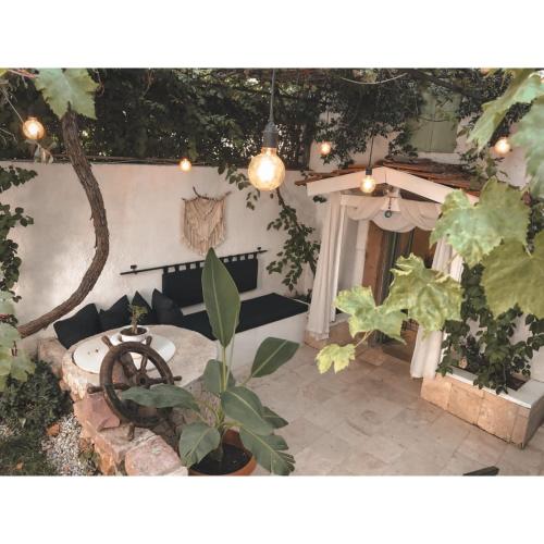 สวน, La Luna Otel Cunda in อยวาลิค