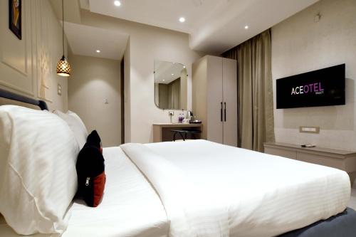 Aceotel Select Tulsi Vijay Nagar - A Luxury Boutique Hotel - Tap to explore photos