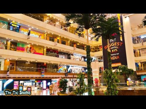 Taj Suites & Studios-Top Place Couple Friendly Stay at Luxury Gaur City Mall #Movie, #Food Court #Shopping